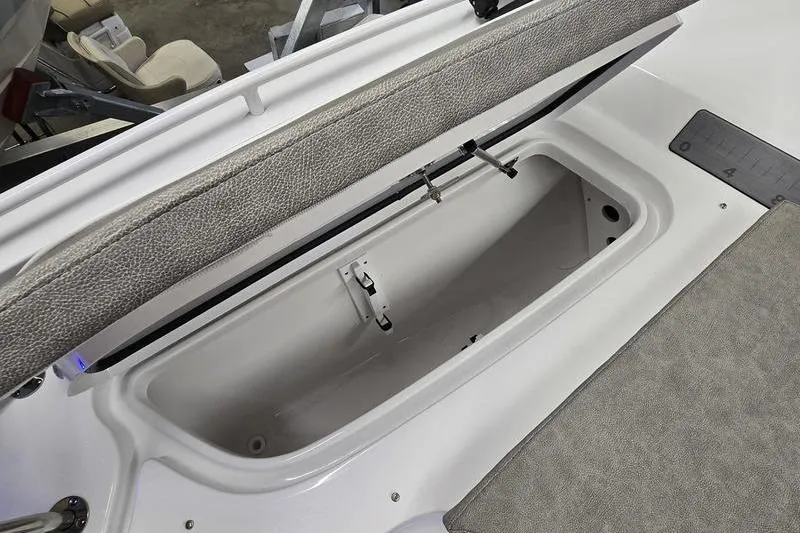 Slide: The Image of Open storage compartment on 2025 Sea Hunt BX 25 FS boat. - 7