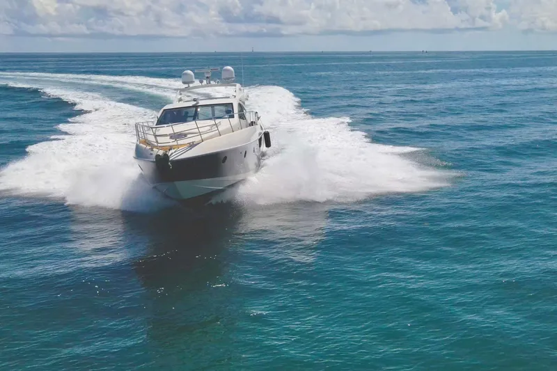 Slide: The Image of Azimut 68S 2011 yacht cruising swiftly on open blue ocean waters. - 4