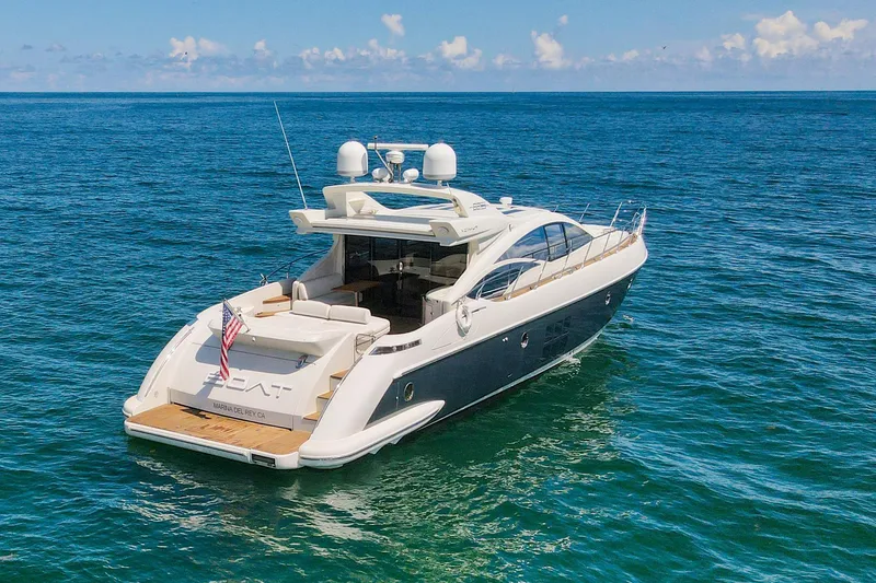 Slide: The Image of Luxurious 2011 Azimut 68S yacht cruising on open sea under clear skies. - 26