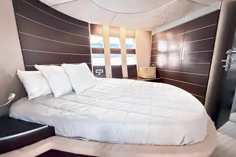 Slide: The Image of Luxurious bedroom interior of 2011 Azimut 68S yacht with modern design and cozy bedding. - 22