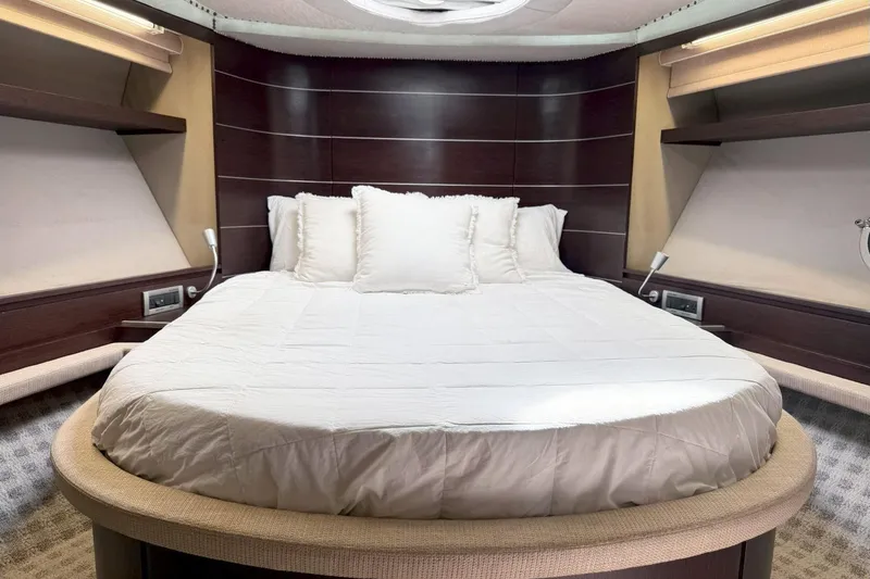 Slide: The Image of Luxurious bedroom interior of 2011 Azimut 68S yacht with elegant bedding. - 25