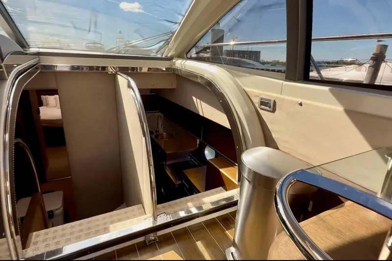 Slide: The Image of Interior view of 2011 Azimut 68S yacht, featuring modern design and luxurious amenities. - 17