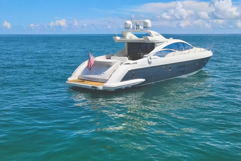 Slide: The Image of Luxury 2011 Azimut 68S yacht cruising on open sea under clear skies. - 3