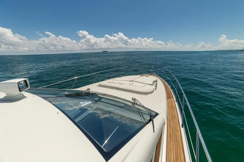 Slide: The Image of Luxurious 2011 Azimut 68S yacht cruising on open sea under clear skies. - 7