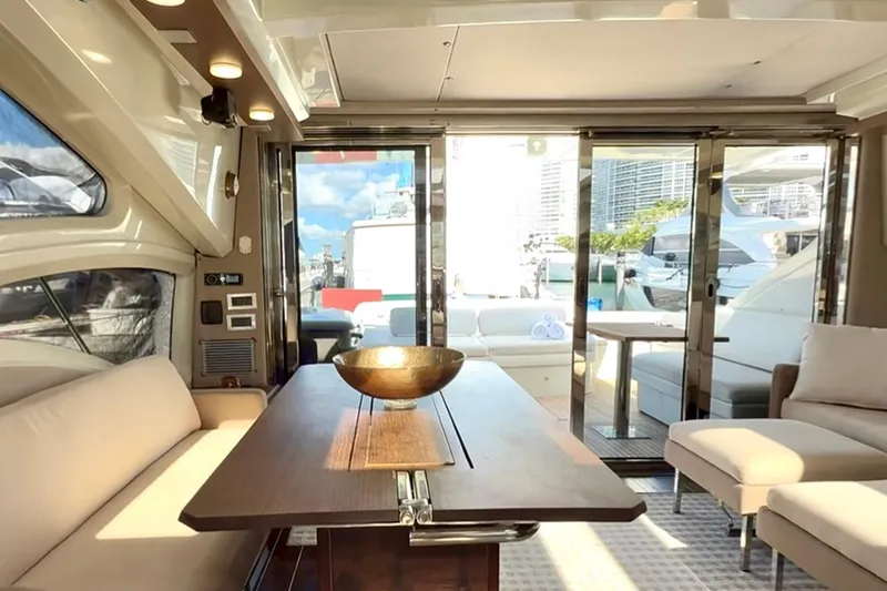 Slide: The Image of Luxurious interior of 2011 Azimut 68S yacht with elegant seating and modern decor. - 15