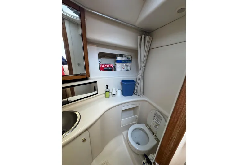 Slide: The Image of Bathroom interior of 1998 Bayliner 4087 Aft Cabin Motoryacht with sink and toilet. - 26