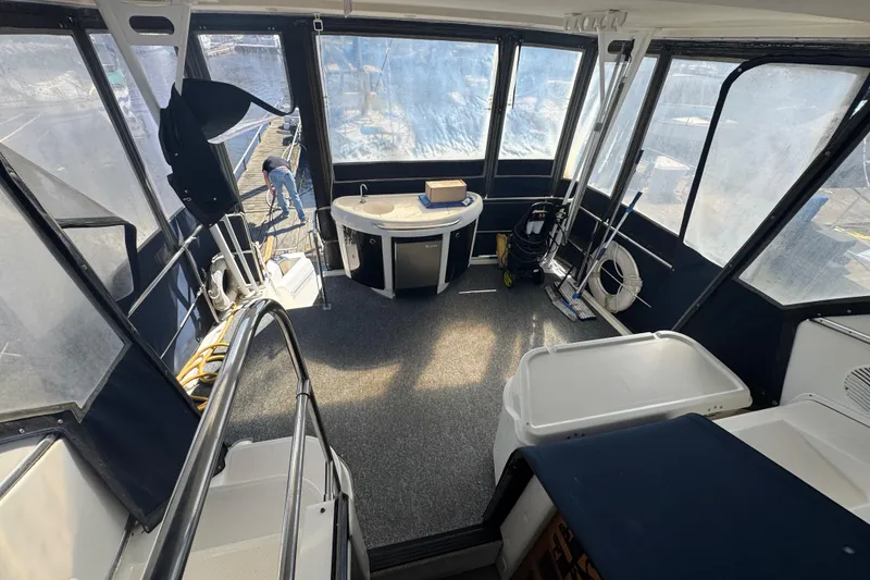 Slide: The Image of 1998 Bayliner 4087 Aft Cabin Motoryacht interior with seating and equipment. - 9