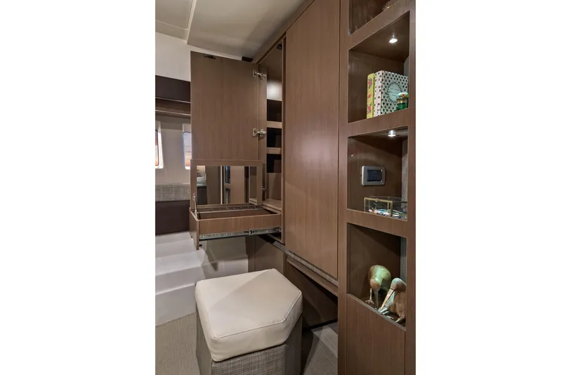 Slide: The Image of Manufacturer Provided Image: 2018 Sea Ray Fly 400 yacht interior with wooden cabinetry and seating. - 13