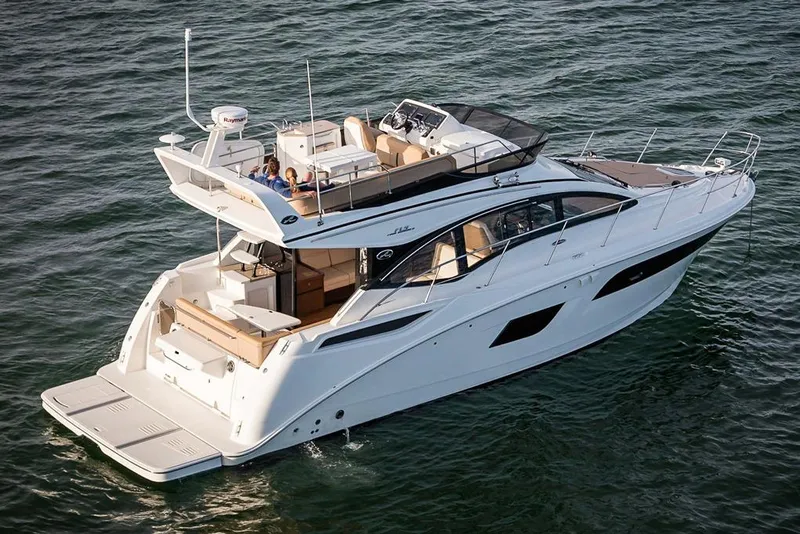 Slide: The Image of Manufacturer Provided Image: 2018 Sea Ray Fly 400 yacht cruising on open water. - 2
