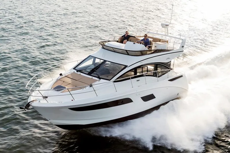 Slide: The Image of Manufacturer Provided Image: 2018 Sea Ray Fly 400 yacht cruising on open water. - 4