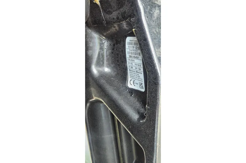 Slide: The Image of Close-up of a 2025 Tahoe T18 model label with serial number details. - 14