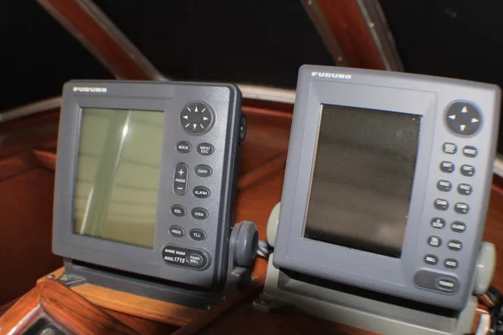 Slide: The Image of 1986 Lynnwood Flybridge Sedan with Furuno marine navigation displays. - 46