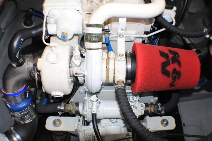 Slide: The Image of Engine of a 1986 Lynnwood Flybridge Sedan with K&N air filter. - 59