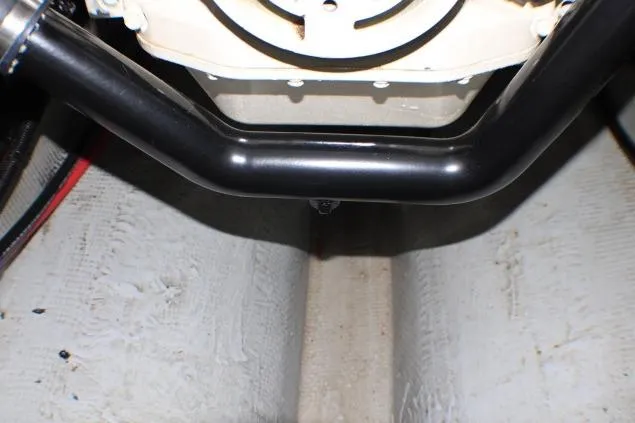 Slide: The Image of 1986 Lynnwood Flybridge Sedan engine compartment with visible black piping. - 65