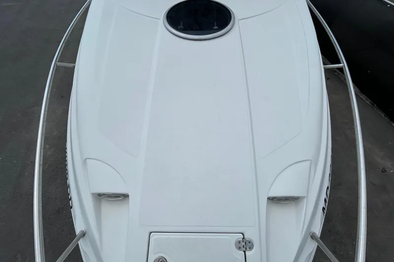 Slide: The Image of Top view of a 2012 Crownline 236 SC boat deck with hatch and railing. - 21