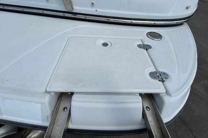 Slide: The Image of 2012 Crownline 236 SC boat swim platform with hatch and stainless steel ladder. - 32
