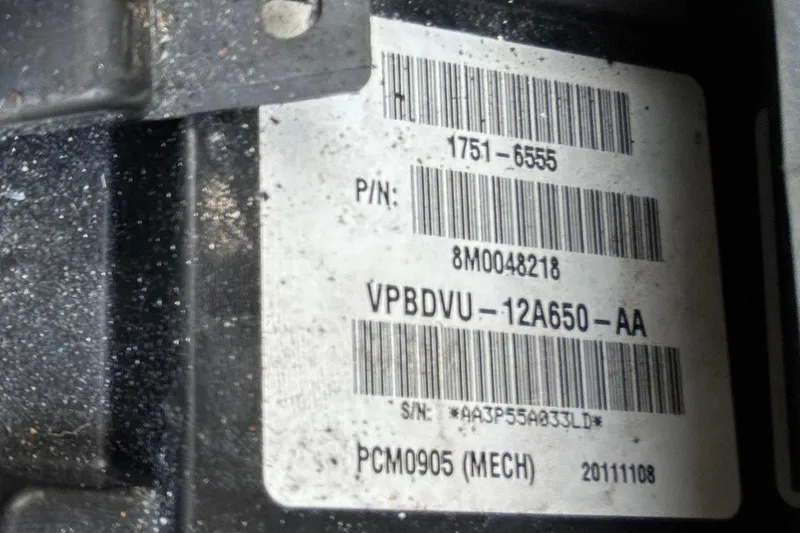 Slide: The Image of Close-up of wiring and components in a 2012 Crownline 236 SC boat. - 38