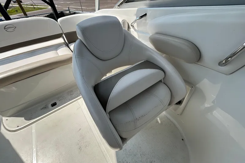 Slide: The Image of 2012 Crownline 236 SC boat interior with white and gray seating. - 60