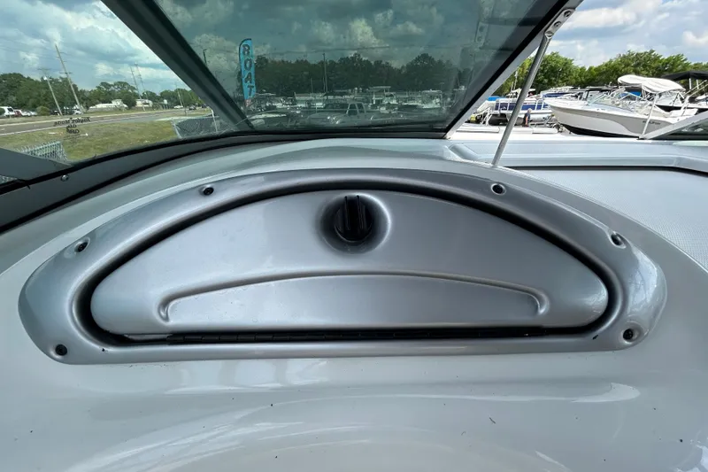Slide: The Image of 2012 Crownline 236 SC boat dashboard with windshield view. - 61