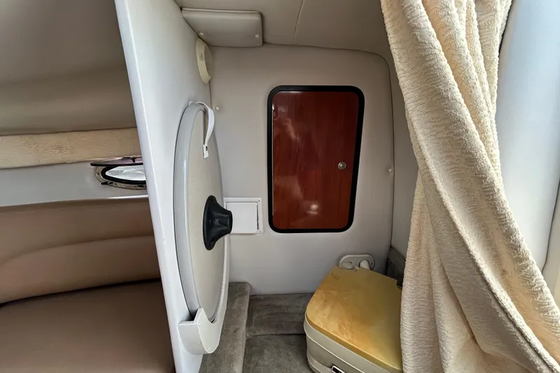 Slide: The Image of Interior cabin of 2012 Crownline 236 SC boat with seating and storage. - 72