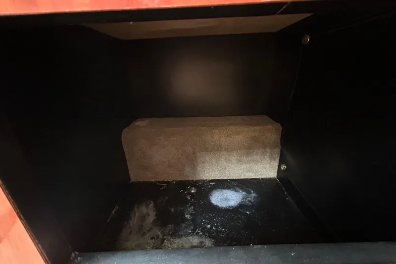 Slide: The Image of Interior storage compartment of a 2012 Crownline 236 SC boat. - 94