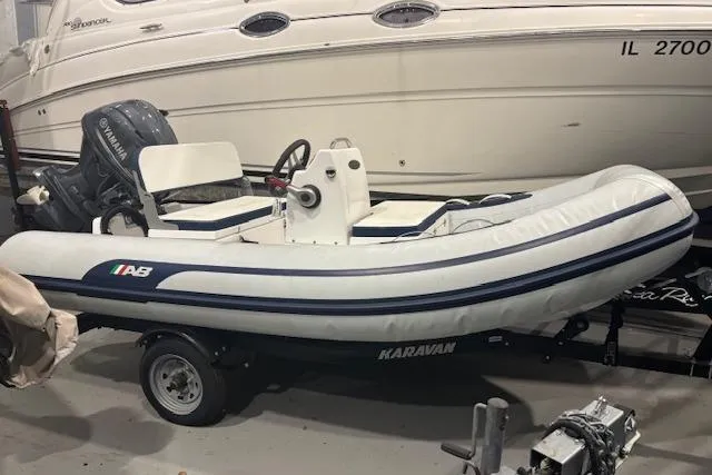 Slide: The Image of 2025 AB Inflatables Mares 12 VSX boat on Karavan trailer in storage. - 16