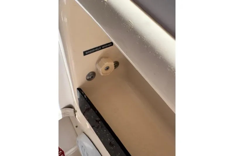 Slide: The Image of Windshield washer control on 2003 Grady-White Marlin 300 boat dashboard. - 38