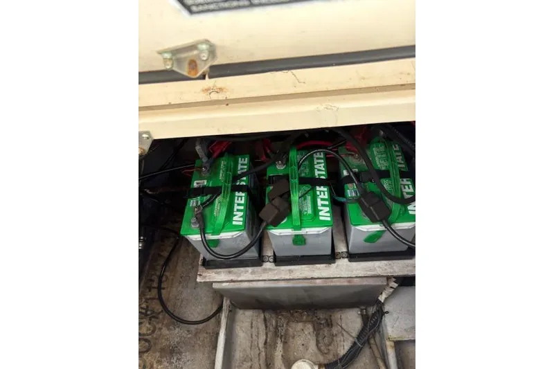 Slide: The Image of Batteries in a 2003 Grady-White Marlin 300 boat compartment. - 42