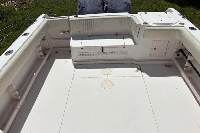 Slide: The Image of 2003 Grady-White Marlin 300 boat deck, spacious and clean, ready for fishing or leisure. - 45