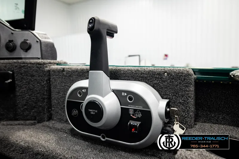 Slide: The Image of Control panel of 2026 Lund 1775 Adventure Sport boat with throttle lever. - 34