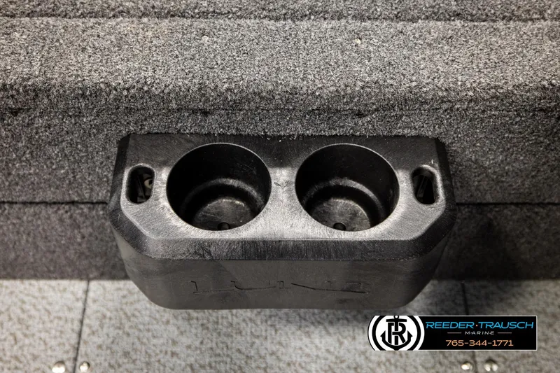 Slide: The Image of 2026 Lund 1775 Adventure Sport boat cup holder, textured surface, Reeder-Trausch Marine branding. - 39