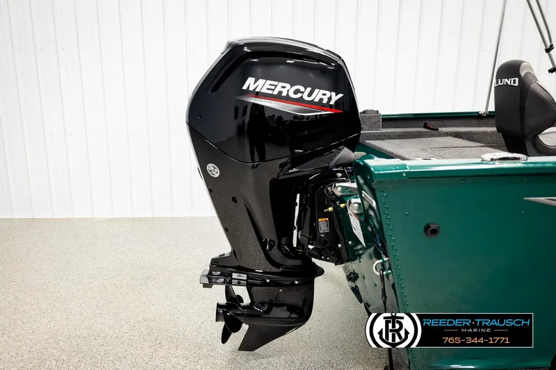 Slide: The Image of 2026 Lund 1775 Adventure Sport boat with Mercury outboard motor in showroom. - 41