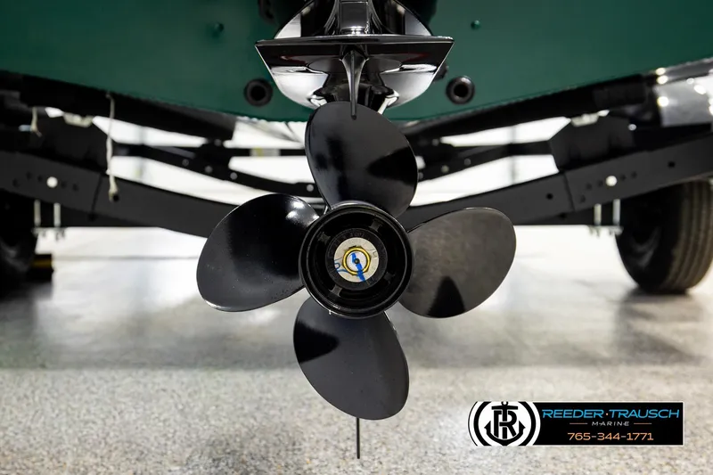 Slide: The Image of 2026 Lund 1775 Adventure Sport boat propeller close-up in showroom setting. - 44