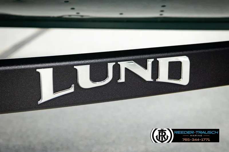 Slide: The Image of Close-up of 2026 Lund 1775 Adventure Sport logo on a boat trailer. - 46