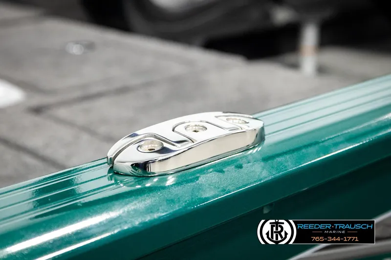 Slide: The Image of Chrome cleat on 2026 Lund 1775 Adventure Sport boat, green finish, Reeder-Trausch Marine branding. - 49