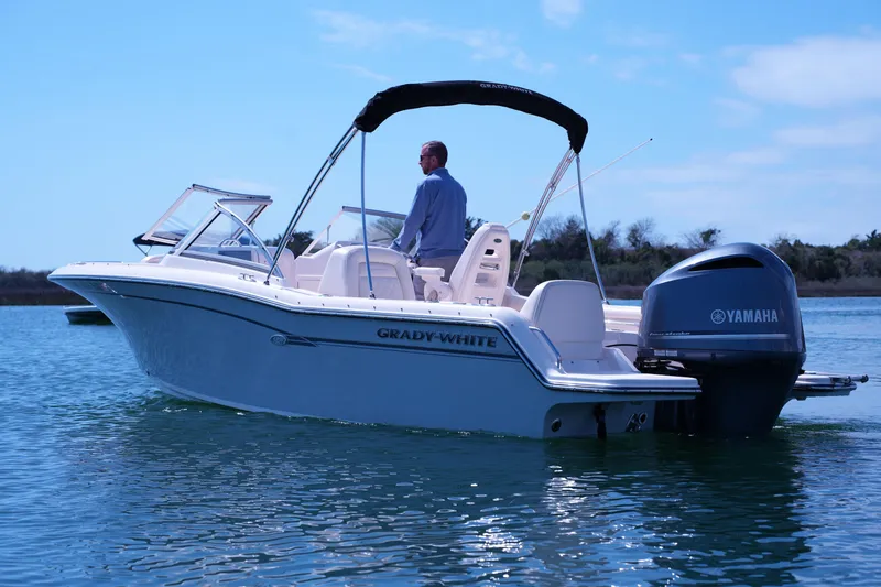 Slide: The Image of 2019 Grady-White Freedom 215 boat on water with Yamaha engine. - 15