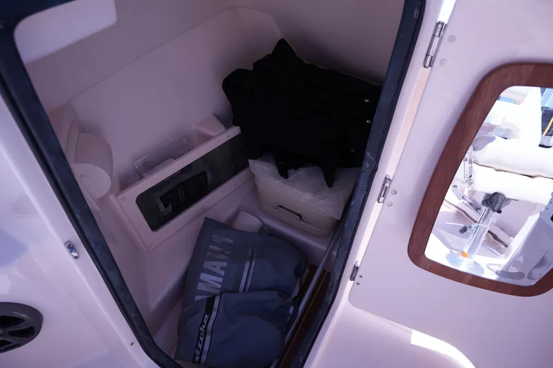 Slide: The Image of Interior cabin of 2019 Grady-White Freedom 215 boat with storage items. - 27