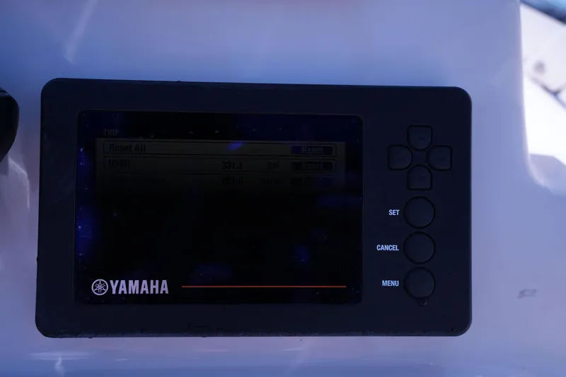 Slide: The Image of Yamaha display panel on 2019 Grady-White Freedom 215 boat dashboard. - 37