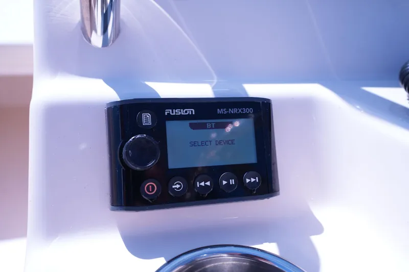 Slide: The Image of Fusion MS-NRX300 stereo system on 2019 Grady-White Freedom 215 boat dashboard. - 38