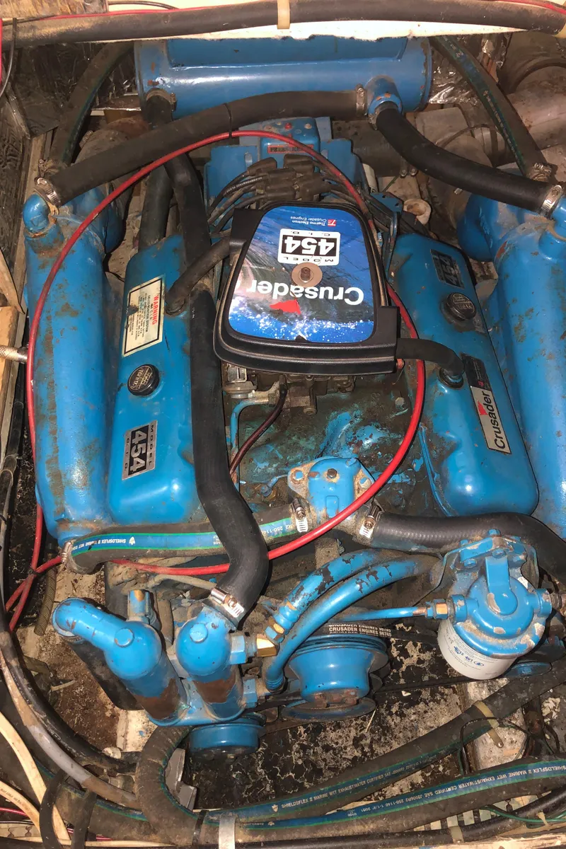 Slide: The Image of 1990 Bluewater Sedan engine compartment with Crusader 454 engine. - 41