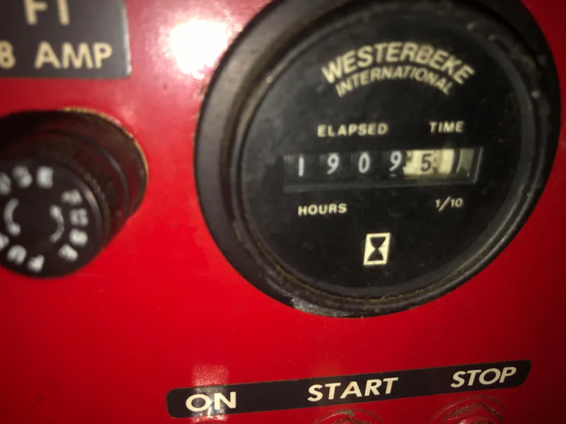Slide: The Image of Close-up of Westerbeke engine hour meter on a 1990 Bluewater Sedan. - 47