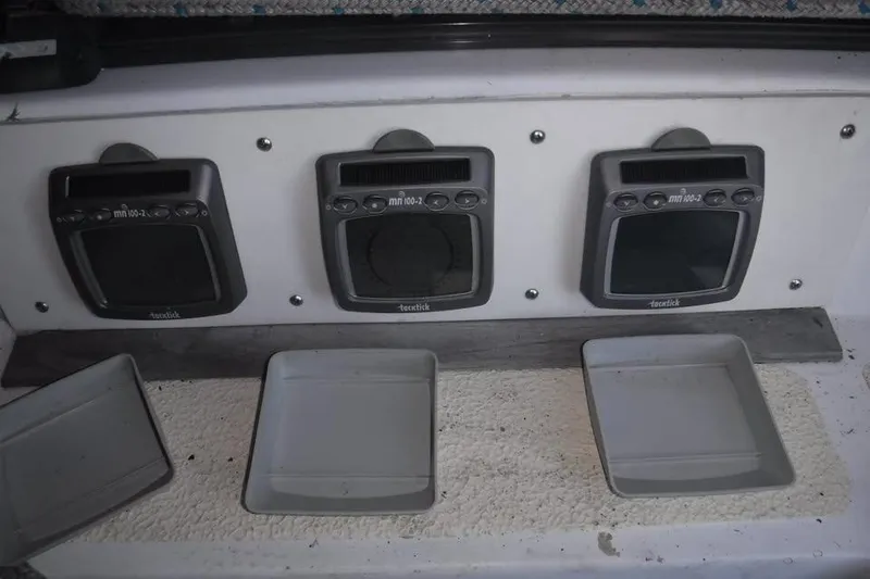 Slide: The Image of Three Tacktick mn100-2 marine displays on a 1986 Fast Masthead Sloop. - 12