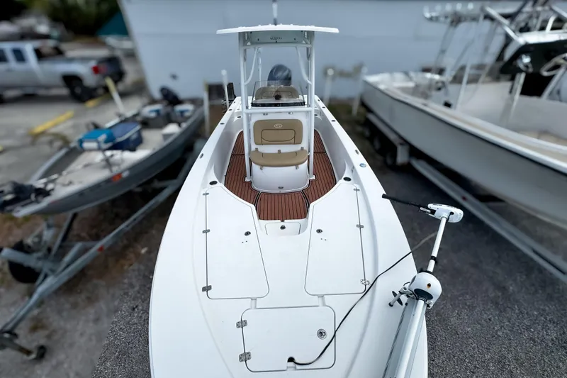 Slide: The Image of 2014 Sportsman Masters 247 Bay Boat with center console and trolling motor. - 14
