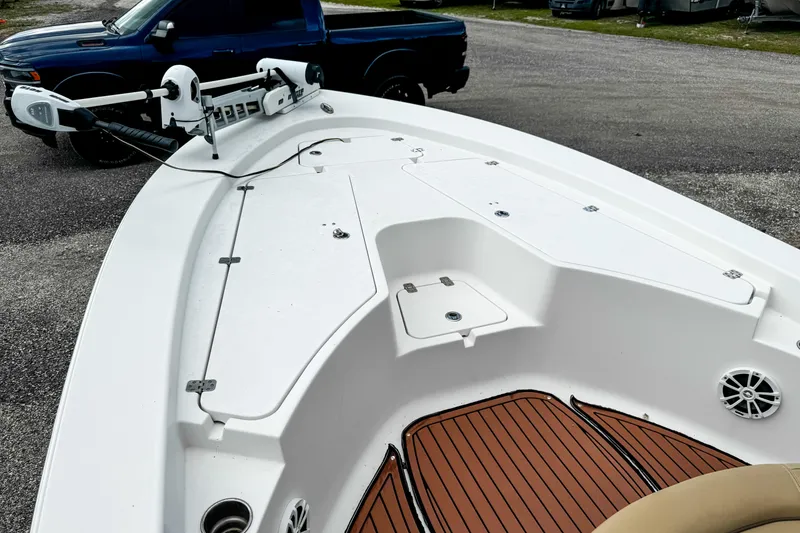 Slide: The Image of 2014 Sportsman Masters 247 Bay Boat with trolling motor and spacious deck. - 16