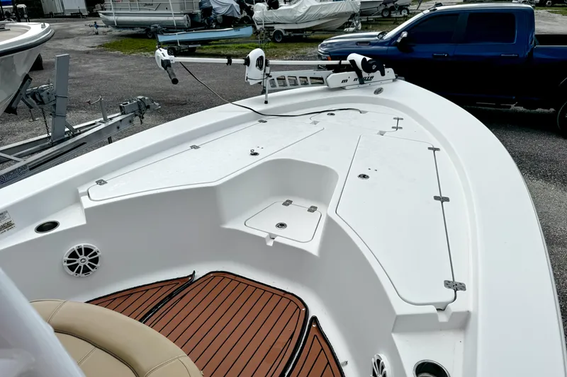 Slide: The Image of 2014 Sportsman Masters 247 Bay Boat with trolling motor and spacious deck. - 18