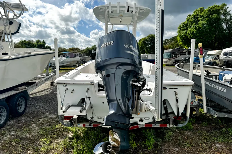 Slide: The Image of 2014 Sportsman Masters 247 Bay Boat with Yamaha 250 engine, parked outdoors. - 5
