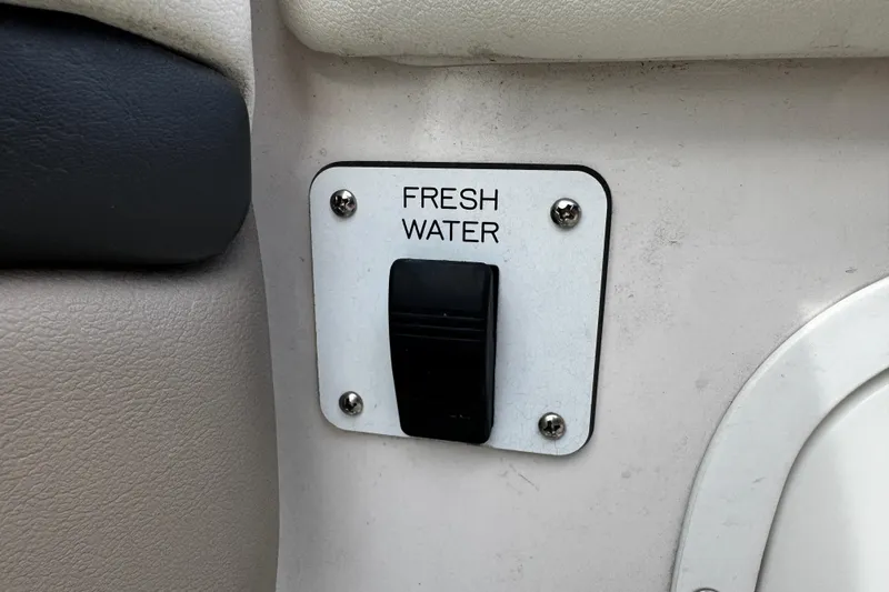 Slide: The Image of Fresh water switch on 2004 Four Winns 205 Sundowner boat interior. - 16