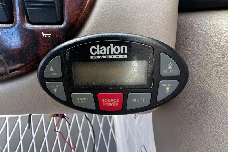 Slide: The Image of Clarion Marine audio control panel in 2004 Four Winns 205 Sundowner boat. - 20