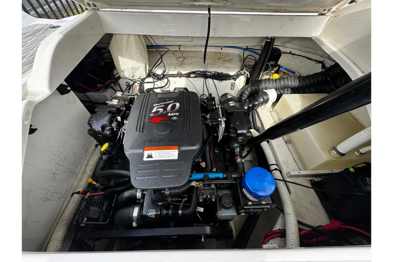 Slide: The Image of 2004 Four Winns 205 Sundowner engine compartment with MerCruiser 5.0 MPI engine. - 3