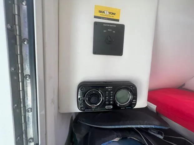 Slide: The Image of Sony stereo system inside 2011 Sea Ray 300 Sundeck boat cabin. - 14